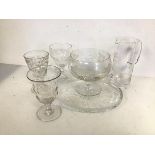 A collection of glass including a cylindrical jug with handle to one side (20cm x 14cm x 8cm), an
