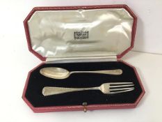 A 1930s London silver fork and spoon (each: 14cm) (combined: 46.05g) in original Harrods