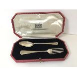 A 1930s London silver fork and spoon (each: 14cm) (combined: 46.05g) in original Harrods