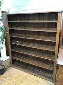 A pine open bookcase fitted seven shelves (192cm x 170cm x 22cm)
