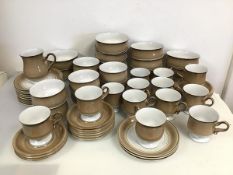 A large collection of Denby dinnerware including eleven footed bowls (7cm x d.14cm), eight smaller