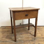 A 1930s oak side table, with crossbanded top above a single frieze drawer, on straight supports
