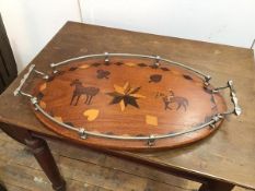 A 1960s drinks tray with raised gallery and handles to side above an oval tray with marquetry