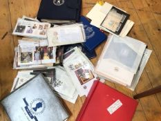 A tub containing a collection of Royal themed First Day covers and stamps, some loose, mainly mint