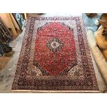 A fine early 20thc Persian carpet, from Joshaghan region, the red field with scrolling vine and