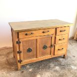 An early 20thc oak pantry cupboard base, fitted single long drawer above pantry door with air