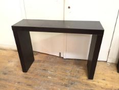 A contemporary console table with dark brown exterior, possibly leather (80cm x 120cm x 36cm)