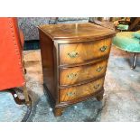 A Burton Reproductions Ltd mahogany small chest of drawers, the moulded top with a bowed front above