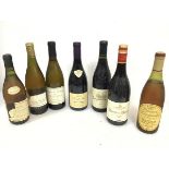 A collection of wines including three white burgundys, two red burgundys, a Cote de Rhone and a