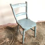 A wooden side chair in eggshell blue painted finish (losses), on turned supports united by H