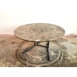 A modern coffee table with marble circular top on metal angled base (37cm x 70cm)