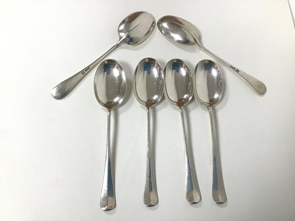 A set of six 1921 Sheffield silver dessert spoons, initialled M (combined: 301.38g)