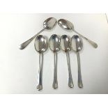 A set of six 1921 Sheffield silver dessert spoons, initialled M (combined: 301.38g)