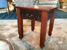 A Chinese square lamp table with blind fretwork to each side, fitted single drawer, on straight