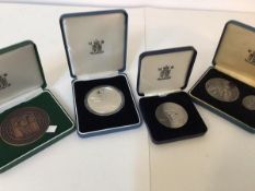 Four silver commemorative Royal Mint medallions, Fleur de Coin Coin Club, Numismatic Society