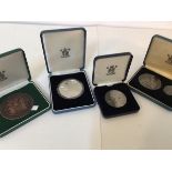 Four silver commemorative Royal Mint medallions, Fleur de Coin Coin Club, Numismatic Society