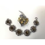 A silver citrine set spray brooch, and a silver Cairngorm set bracelet (17cm)