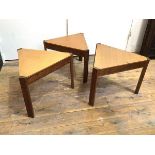 An unusual set of three triangular occasional tables with teak tops on oak frames with straight
