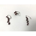 A silver garnet cluster ring with four stones (L/M) and a pair of drop earrings