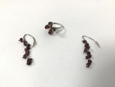 A silver garnet cluster ring with four stones (L/M) and a pair of drop earrings