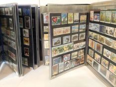 Two volumes containing Ireland collection of unmounted mint stamps, 1977-2013, sets are fairly