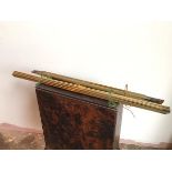 A set of fifteen brass stair rods (each: 88cm) and six brass door thresholds (each: 77cm)