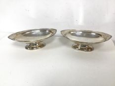 A pair of Edwardian Sheffield silver navette shaped footed dishes, both inscribed Sorley, Glasgow to