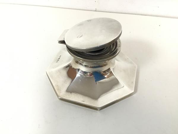 A 1930 Birmingham silver Capstan style inkwell, complete with glass liner (6cm x 12cm) (total: 338.