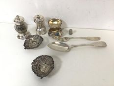 A collection of silver including an 1834 London silver serving spoon, a London 1799 silver fork,