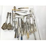 An assortment of Epns including mother of pearl handled fruit knives and forks, grape scissors,