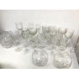 A collection of stemware of various cuts, etchings and designs, including six etched and cut glass