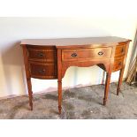 A Wade Furniture reproduction mahogany sideboard with satinwood crossbanding, fitted single frieze