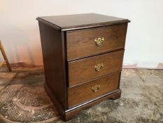 A Stag Georgian style neat chest of drawers fitted three drawers, with drop handles (63cm x 53cm x