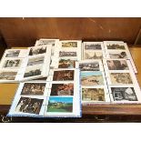 A collection of postcards including UK., Europe and World, and notable individuals such as Winston