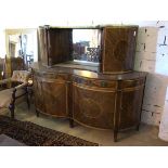 A mid 19thc sideboard the upper tier with gallery top, corner doors to sides and turned supports