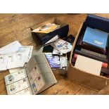 A large box containing a collection of general stamps, First Day Covers etc. including Britain, US