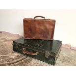 A vintage metal travelling case, with painted faux alligator skin exterior, interior top stamped W&S