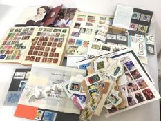 A collection of stamps including two albums with UK, European and Worldwide stamps, other loose