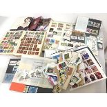 A collection of stamps including two albums with UK, European and Worldwide stamps, other loose