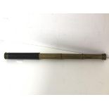 An Edwardian three draw brass telescope, inscribed J. Lizars, Glasgow, Edinburgh etc. (extended: