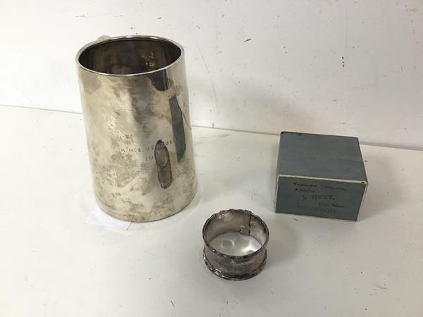 A 1913 Chester silver mug inscribed to front HMS Hercules, 1914 with glass bottom, a Birmingham