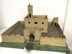 A 1940s/50s wooden toy castle, gate bears painted plaque Loch Lomond Castle above drawbridge, with