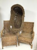 Two 1930s/40s children's wicker chairs including a garden lounger style chair and a baby's basket