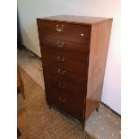 A Lebus mid century teak tall chest of drawers, fitted six graduated drawers, with metal handles, on