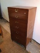 A Lebus mid century teak tall chest of drawers, fitted six graduated drawers, with metal handles, on
