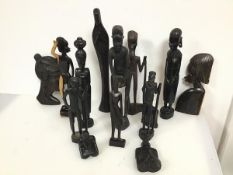 A group of carved hardwood African figures and two busts (tallest: 39cm) (14)