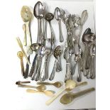 A large assortment of Epns flatware including forks, knives, spoons, serving spoons, ladles and an