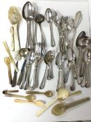 A large assortment of Epns flatware including forks, knives, spoons, serving spoons, ladles and an