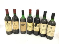 A group of seven bottles of 1970s/80s Bordeaux including Reading Room Claret, Chateau Montlabert,