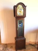 A modern grandfather clock in mahogany case, the domed top above a face inscribed Richard Broad,